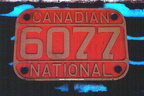 6077p