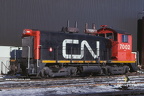 7002b