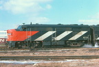 6772b